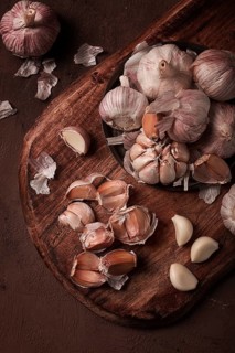 Fresh garlic, on a dark background, top view, food concept