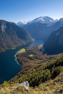 View of the Königssee with St. Bartholomä church, from the Rinnkendlsteig mountain hiking trail,