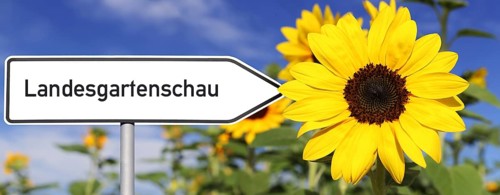 Symbolic image of the State Garden Show: Directional arrow with the inscription Landesgartenschau