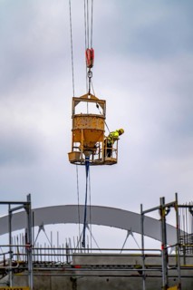 Concreting work on a construction site, new construction of a high-rise office building, facade of