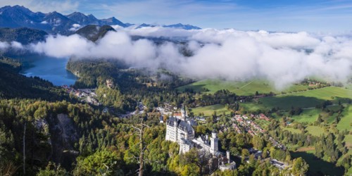 Neuschwanstein Castle and the Alpsee, near Hohenschwangau, Romantic Road, Ostallgäu, Bavaria,
