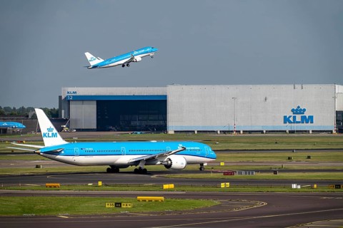 Amsterdam Schiphol Airport, aeroplanes on the taxiway, KLM aircraft taking off from the