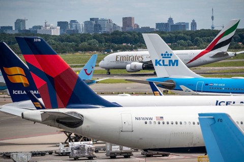 Amsterdam Schiphol Airport, aircraft at the terminal, Gates D, check-in, apron, skyline of