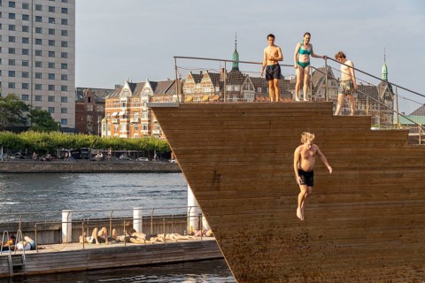 Summer, swimming in the harbour of Copenhagen, there are official bathing places, harbour baths and