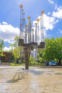 Modern fountain sculpture with bubbling water and blue sky in the background, Böblingen, Germany,