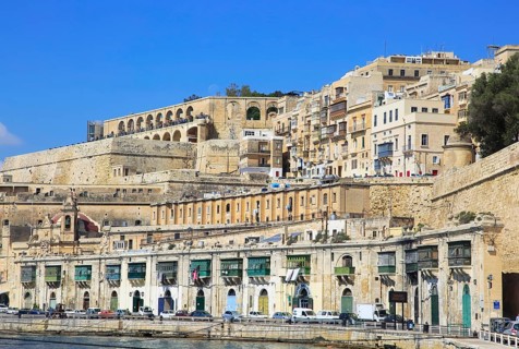 Historic waterfront buildings on Grand Harbour waterside, Valletta, Malta, Europe