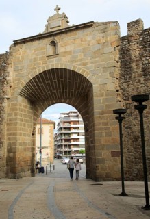 City walls gateway looking out to modern city, Plasencia, Caceres province, Extremadura, Spain,