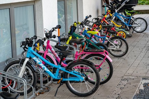 Children's bicycles in front of a day care centre