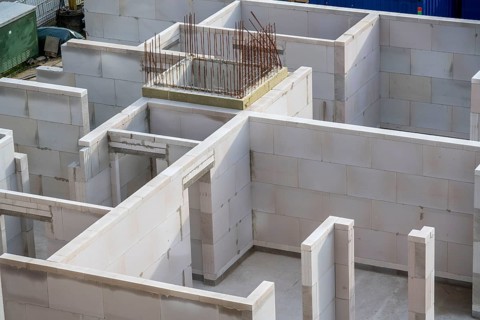 Building site, shell construction, walls of a residential building are finished, lift shaft