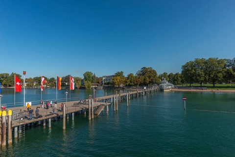 Nonnenhorn on Lake Constance, jetty, marina, townscape, flags, blue sky, Bavaria, Germany, Europe