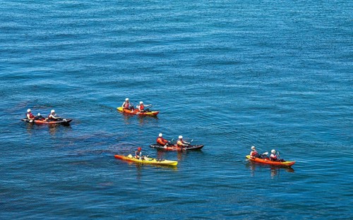 People on kayaks, White Cliffs. Old Harry Rocks Jurassic Coast, Dorset Coast, Poole, England,