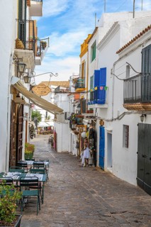Narrow alley with shops and restaurants in the old town of Eivissa, Ibiza Town, Ibiza, Balearic