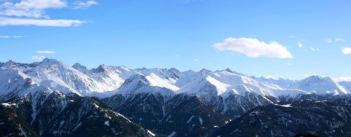 Alpine panorama with snow-covered mountain peaks in winter. Taken in the ski resort of Serfaus Fiss