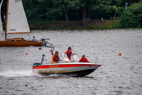 Lake Baldeney, sailing boat, DLRG rescue boat on an alarm trip, Essen, North Rhine-Westphalia,