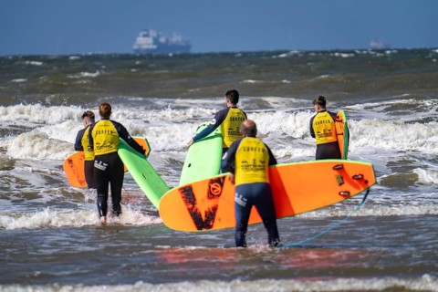 Course for surfers, surfing beginners, on the beach of Scheveningen, Netherlands