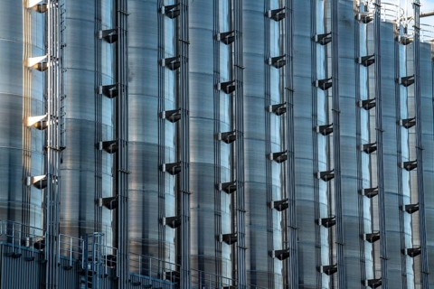 Stainless steel tanks of a large silo facility in Duisburg inland harbour, Duisburg-Neuenkamp, for