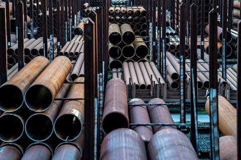 Warehouse for steel pipes in Duisburg harbour, steel pipes in various diameters, North