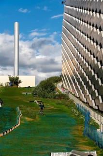 CopenHill, waste incineration plant and artificial ski slope, skiing with a view of the ski lift,