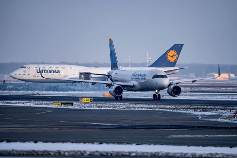 Lufthansa Boeing 747-8, Discover Airbus A320-200, on the way to Runway West, Frankfurt FRA Airport,