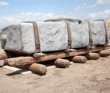 Replica of megalithic transportation of large stones at the Stonehenge visitor attraction site,