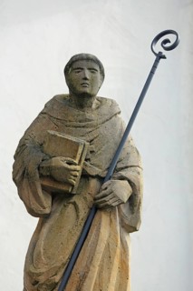 Sculpture and monument to monk Sanctus Bernardus, Bernhard von Clairvaux, with crosier, saint,