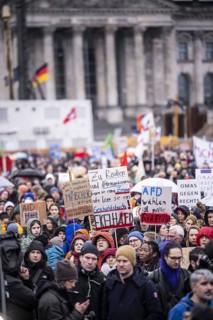 150, 000 people gather around the Bundestag in Berlin to build a human wall against the shift to