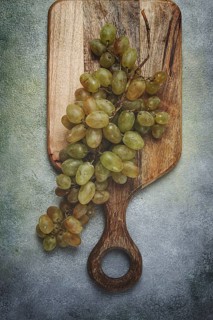A branch of white grapes, wine grapes, Georgian grape variety Rkatsiteli, top view