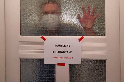 Symbolic image Domestic quarantine, man is in isolation at home due to a suspected corona
