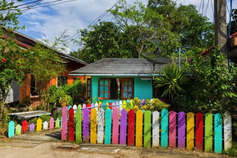 Pastel-coloured house with colourful fence, colourful, colourful, imaginative, living, building,