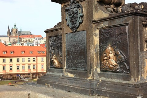 The bronze statue of St John Nepomuk on Charles Bridge, Prague, Czech Republic, Europe