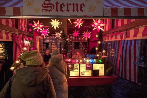 Christmas stall with paper stars, Christkindlesmarkt, Nuremberg, Middle Franconia, Bavaria,