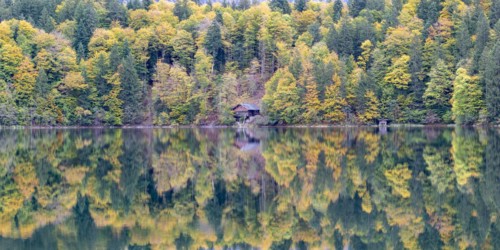 Freibergsee lake in autumn, near Oberstdorf, with the Allgäu Alps behind it, Allgäu, Bavaria,