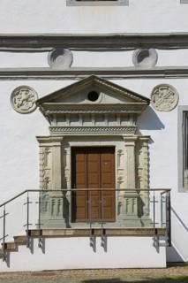 Door in the inner courtyard, castle courtyard, wooden door, entrance, coat of arms medallions,