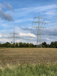 Two overhead line pylons High-voltage pylons Power pylons Support pylons Suspension of electrical