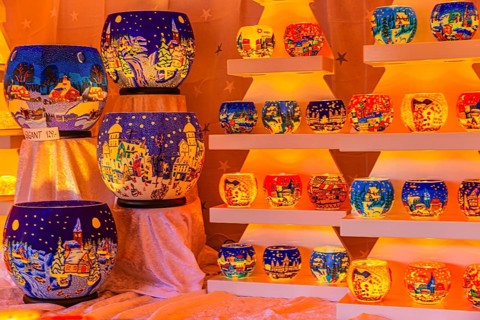 Colourful tea lights in a stall at the Christmas market at City Hall, Vienna, Austria, Europe