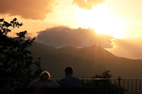 Couple watches the sunset on mountains, Sepino, Molise, Italy, Europe