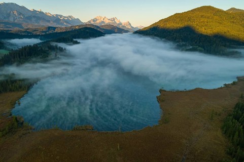 Aerial view of a mountain lake in front of mountains, sunrise, fog, autumn, Barmsee, view of