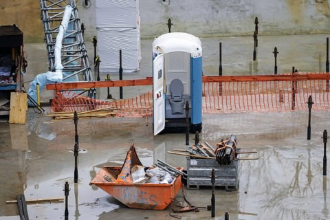 Symbolic photo on the subject of the shortage of skilled labour. A porta-potty with an open door
