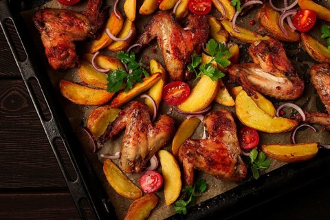 Fried chicken wings, with potatoes, and spices, homemade, fast food, no people