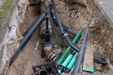 Construction site, excavation pit, work on supply lines, various types, electricity, water, gas,
