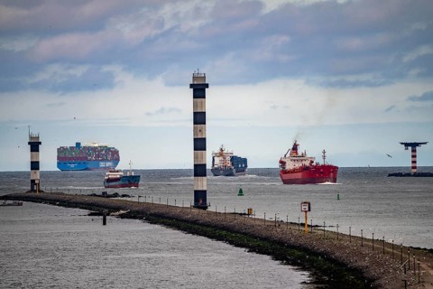 Entrance to the seaport of Rotterdam, various ships, container freighter, Cosco Shipping Aries,