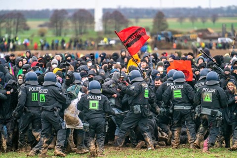 Violent clashes between thousands of demonstrators and the police, after a demonstration against