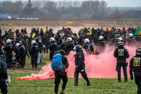 Violent clashes between thousands of demonstrators and the police, after a demonstration against