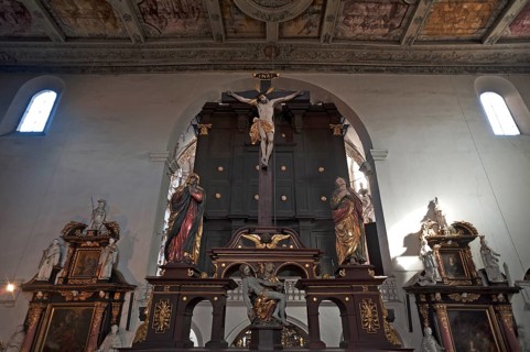 Altar above painted coffered ceiling in the Basilica of St Emmeram. Regensburg, Upper Palatinate,