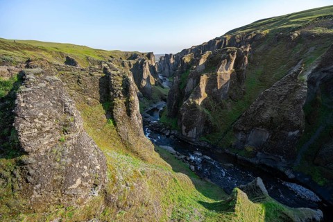 Fjaðrárgljúfur Canyon, Fjadrargljufur, rock formations in rugged deep canyon with river in the
