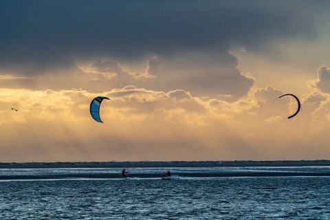 Kitesurfer, North Sea, weather, storm, sunset, North Sea island Borkum, East Frisia, Lower Saxony,