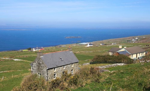 Houses along the west coast of Cape Clear Island, County Cork, Ireland, Irish Republic, Europe