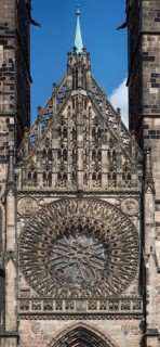 Gothic rose window with central pediment from the main portal of St SLorenz, Nuremberg, Middle