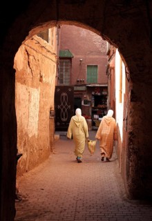 2 woman in an old town alley in the Medina, Marrakech, Morocco, Africa