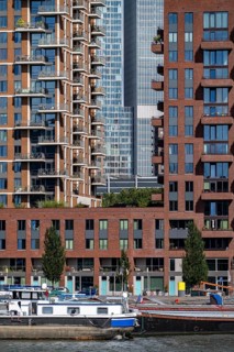 Harbour basin of the Maashaven, inland waterway port, jetties, residential buildings in the Kop van